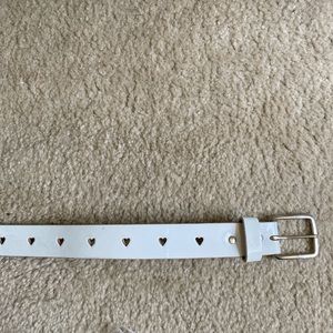 white belt with heart cutouts